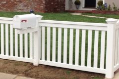 Front yard picket vinyl fence with mailbox