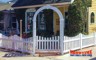 Vinyl Fence in front of yellow house